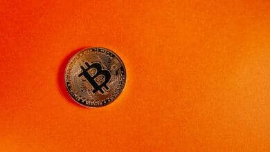 Bitcoin on orange background